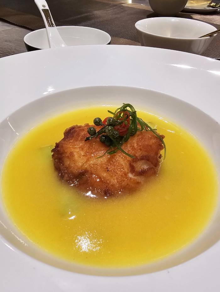 Poached Norway Cod Fish with Spicy & Sour Rattan Peppers Broth