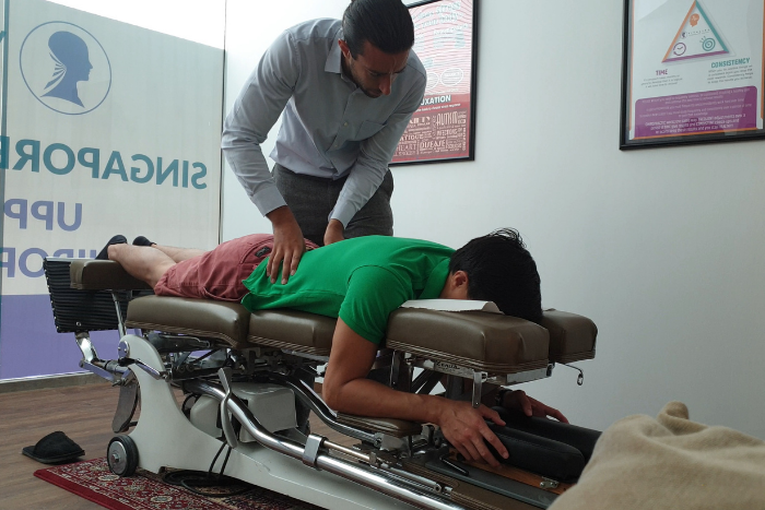 chiropractic-things-to-know-dr-shaan-rai-with-male-patient-examination