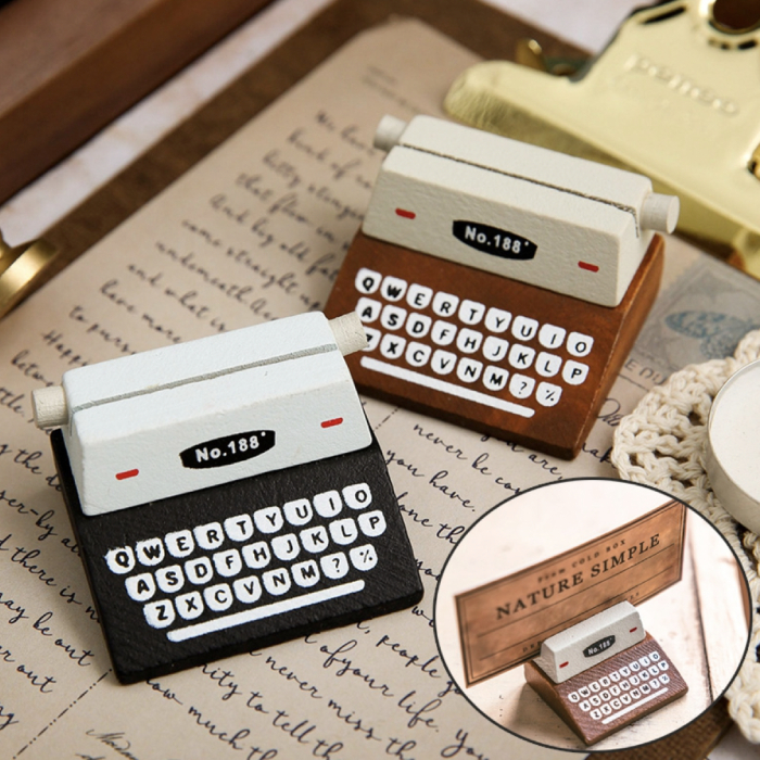 decorate office desk singapore - typewriter