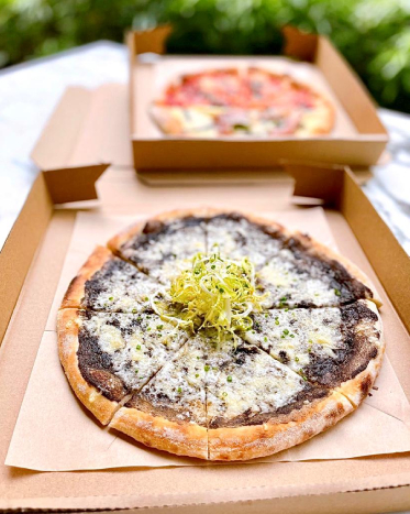 Photo of black truffle and fortina cheese pizza