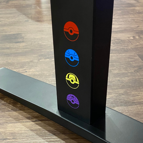 omnidesk-pokemon-standing-desk-collection-pokeball-details-on-metal-leg-stand