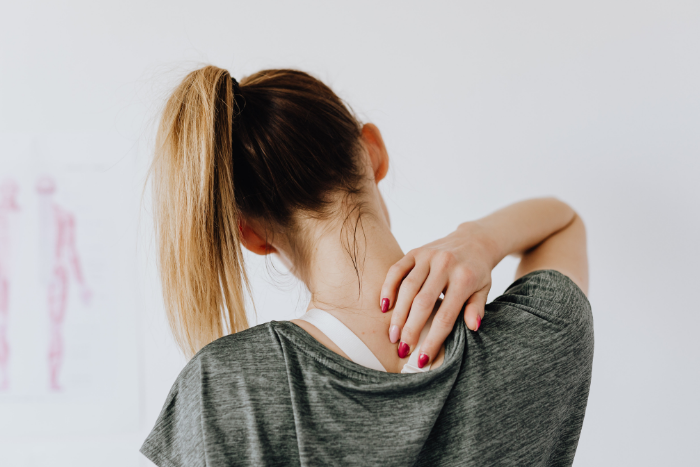woman-touching-spine-back-view